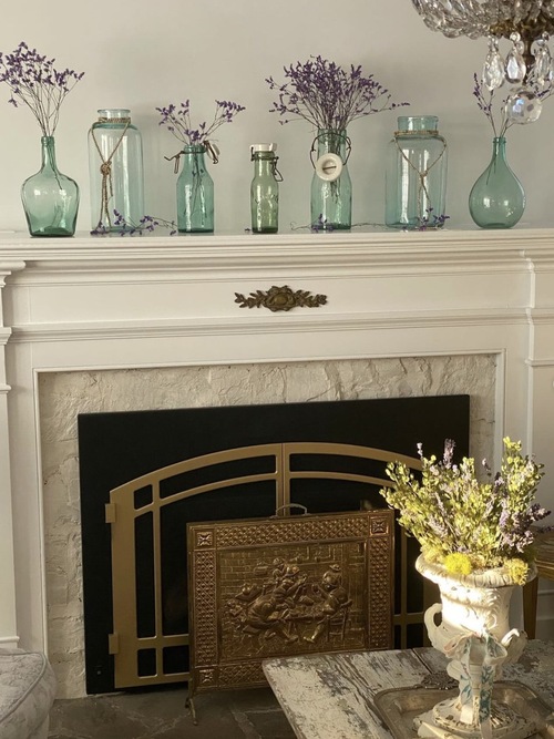 Mantel Decorating Ideas with glass bottles