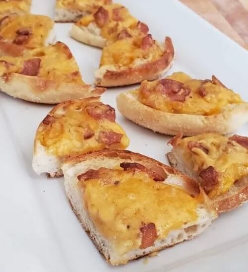 Cheese and bacon toasts on dough