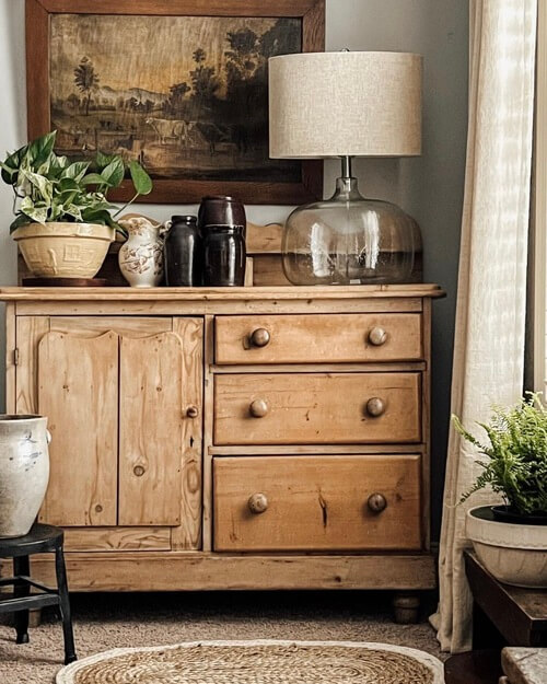 farmhouse wooden furniture and a lamp