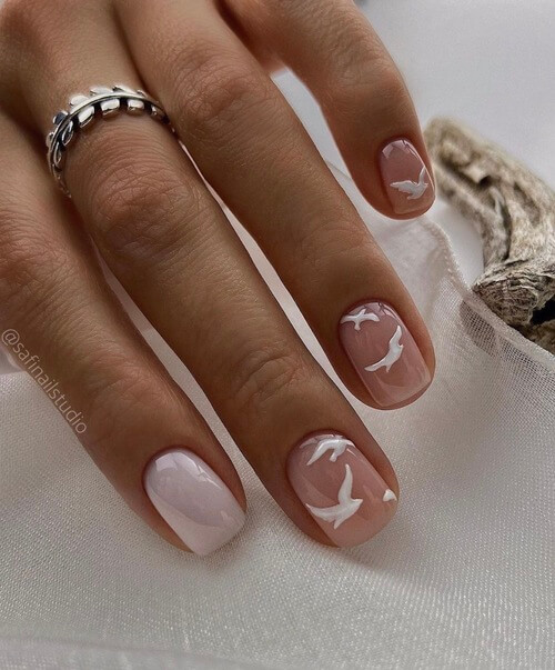 sky nail designs with white birds
