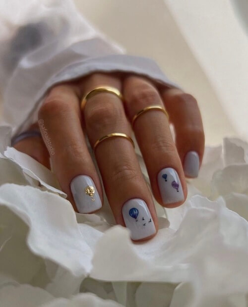 sky nail designs with hot air balloons and birds