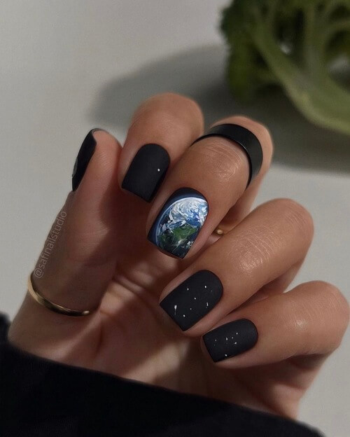 sky nail designs with globe